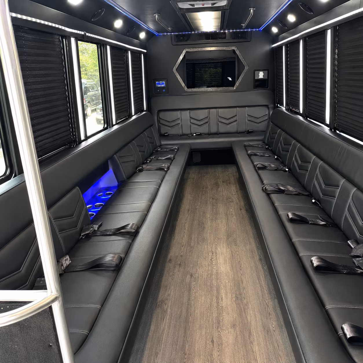 Wedding guests seated inside a party bus serving Syracuse